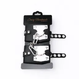 Наручники из черной кожи с белым декором