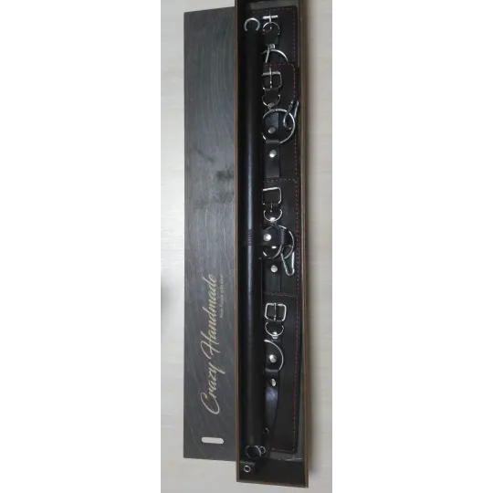 Набор для бондажа: большая распорка, наручники, оковы.