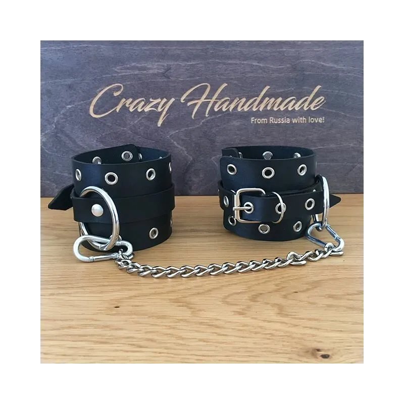 Наручники черные, однослойные с люверсами